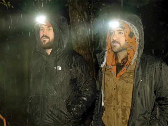 From left, Brad Kennedy and Luke Pilgrim look for evidence in the rain. (Photos contributed by Sozo Bear Films)