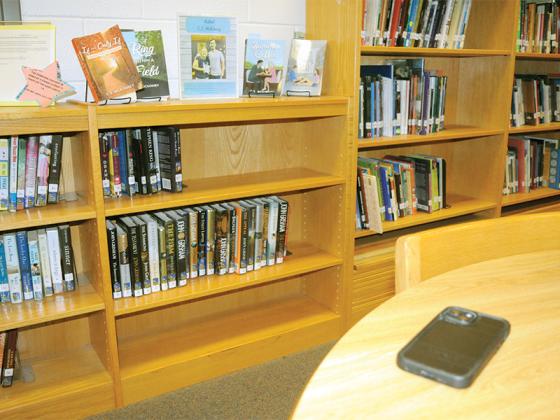 A cellphone sits on a table in Clear Creek Middle School’s library.