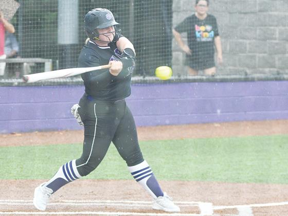 Gilmer senior Lady Cat Phoenix Addie zeros in on a pitch versus Heritage last Tuesday and finished with a hit and scored two runs.
