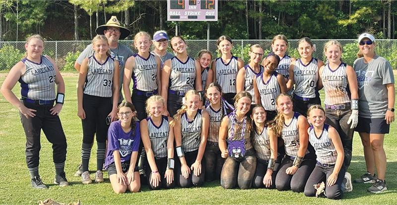 Pictured are Clear Creek softball players and coaches following another league victory.