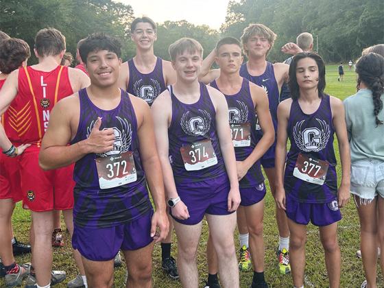 Above are the Gilmer High Bobcats and Lady Cats ahead of their first cross-country race of the season last Saturday in Canton.