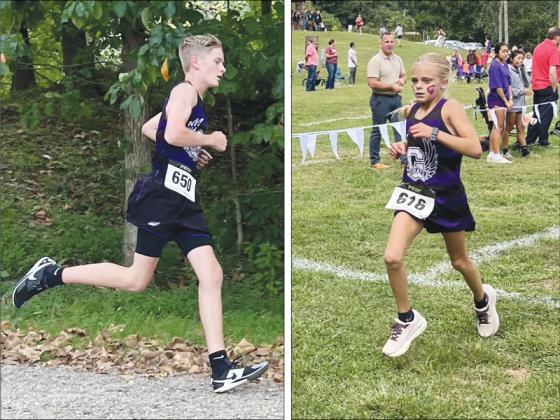 From left are Clear Creek runners Jackson Towns and Lakelyn Garret. They were the first Bobcat and Lady Cat, respectively, to finish their races last Thursday. (Contributed)