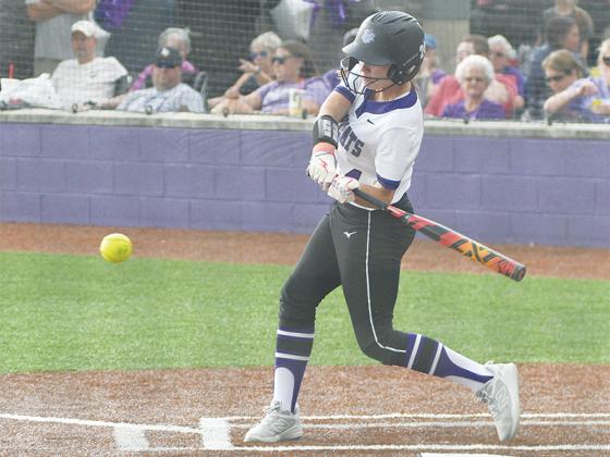 Sarah Dale (right) sizes up a pitch for the Lady Cats. GHS has won four of its last five region games.