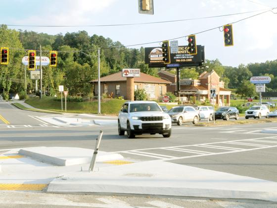 With its light now working, traffic flows through the intersection between GA 515 and First Avenue on Sept. 12.