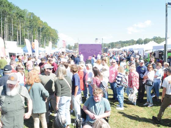 Crowds sample the food, handmade goods, art and activities of the Georgia Apple Festival Saturday, Oct. 11. The event’s first weekend experienced beautiful weather.