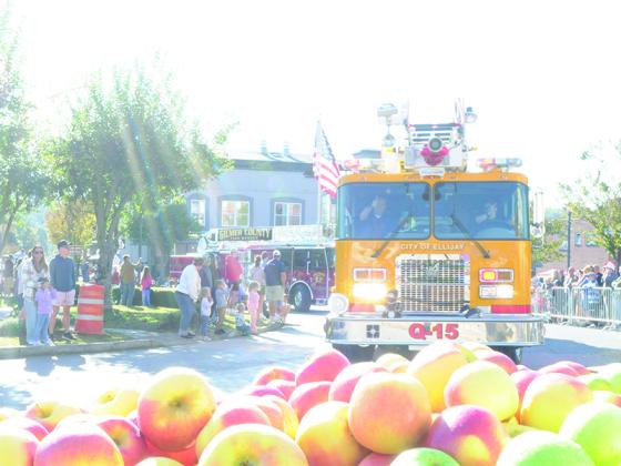 A City of Ellijay fire truck leads the Georgia Apple Festival Parade through downtown Ellijay, Saturday, Oct. 11. Guests at the parade celebrated community first responders and other groups as they enjoyed local apples and arts.