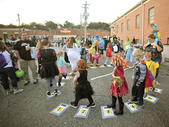 Kids and crowds enjoy the Fall Festival at First Baptist Church of Ellijay.