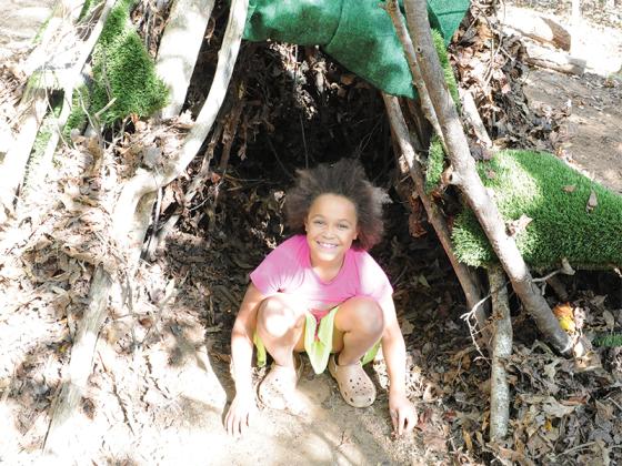 Harvey Bogue takes shelter in her teepee in Mountainside Village.