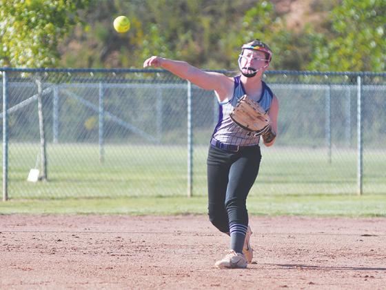 Clear Creek shortstop Lily Teague makes a throw to first for an out Monday versus Pickens.