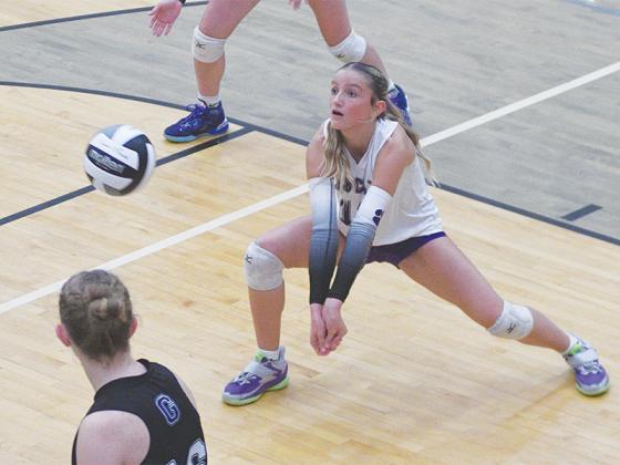 Gilmer High School freshman Roxy McVey digs up a serve and will be one of six returning starters for the Cats next season.