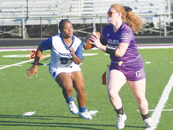 GHS quarterback Mattie Jones eludes a Ringgold defender.