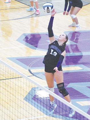 Gilmer’s Adleigh Sutton hits at the net, and the Lady Cats  begin the state volleyball playoffs today at LaFayette at 5 p.m.