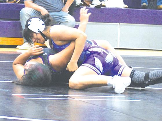 Abelinda Tercero is moments away from a pin at last Tuesday’s intrasquad match and she placed fourth at state last season.