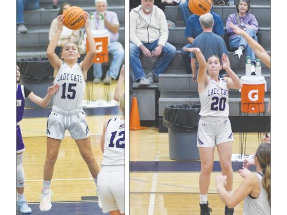 From left, Mia Crump grabs a rebound, Neeyah McDaniel shoots a baseline jumper.