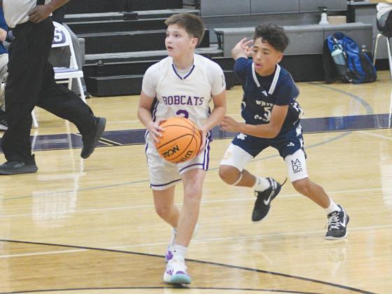 Reece Bramlett sets up a shot.