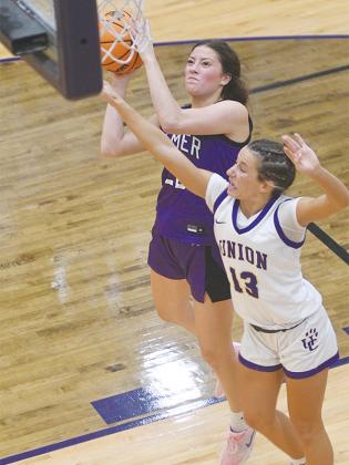 Chelsey Griggs drives to the basket during the Lady Cats’ 56-53 victory over Union County.