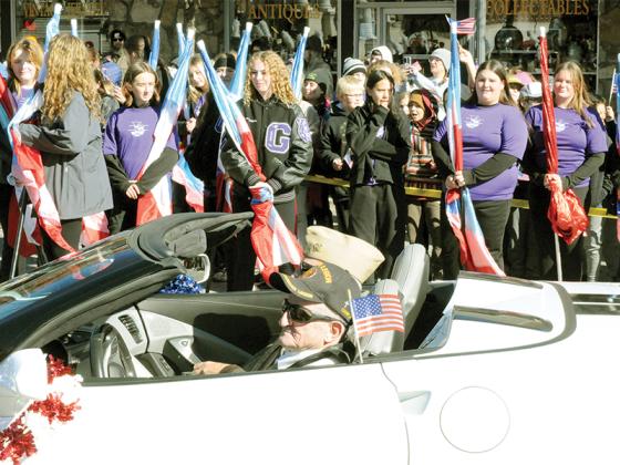 Two local veterans ride through downtown Ellijay in the Nov. 11 Community Veterans Day Parade, themed around “Peace Through Strength.” They are among Gilmer County’s many men and women who served.