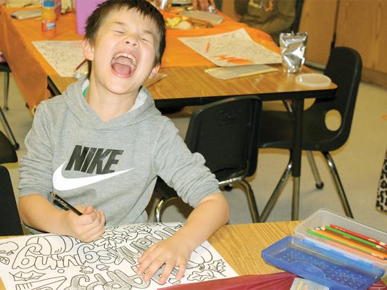 Ellijay Elementary School first-grader Tyvan Seabolt makes a funny face during a Charlie Brown Thanksgiving Feast Friday, Nov. 21. Along with the rest of the first grade, he celebrated this classic American cultural touchstone.