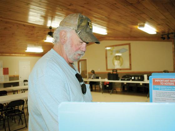 Gilmer goes to the polls — James Lanning votes in the Gilmer County election for the public service commissioner and for a proposed Special-Purpose Local-Option Sales Tax (SPLOST) money, at the Coosawattee Shrine Club, Tuesday, Nov. 4. He said he believes SPLOST should be earmarked for more particular uses. In early voting, 2,253 votes were cast.