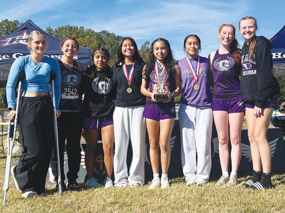 From left are GHS Lady Cat cross-country runners Ella Schwartz, Estephany Becerra, Liz Gonzalez, Allison Hernandez, Jennifer Garcia, Salma Gonzalez, Lauren Smith and Jayla Walker.