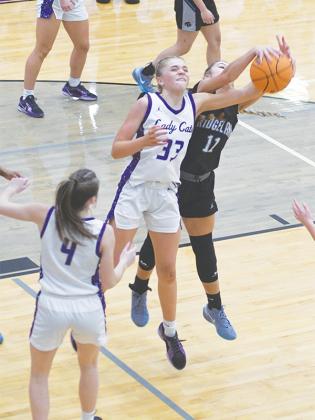 Junior Jace Sanderson battles for a rebound and was voted to the all-region first team last season.