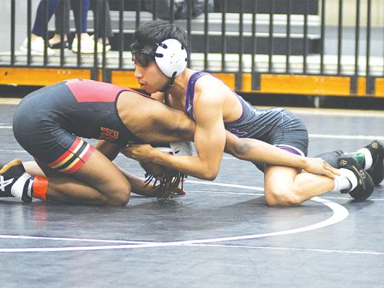 Gilmer’s Deyson Lopez (right) placed sixth at last Saturday’s Panther Invitational in Jackson County.