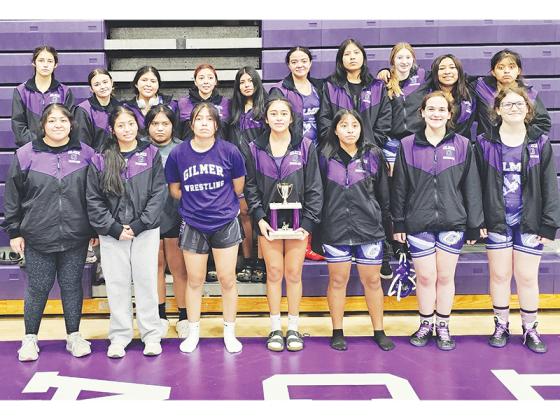 Above are Gilmer High School Lady Cat wrestlers following their third-place finish at last Saturday’s home tournament. 