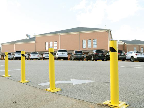 New obstacles bar an entrance as cars park in the First Baptist Church of Ellijay’s lot on a busy Wednesday, Nov. 26. For the downtown, the church’s parking lot helps provide extra spots when many people are touring Ellijay’s businesses.