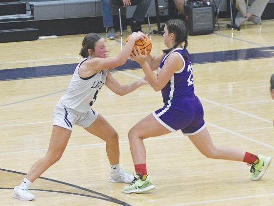 Eighth-grader Maylee Bramlett plays stingy defense.
