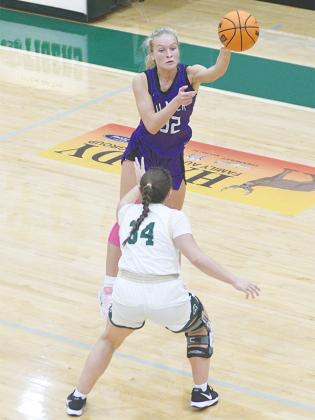 Gilmer’s Paula Robertson passes the ball inside versus Adairsville last Friday and finished with seven points, six assists and six rebounds.