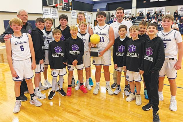 Above are seventh-grade Clear Creek Middle School basketball players  and coaches following the Mountain League championship game versus the Dawson County Tigers. (Contributed photo)
