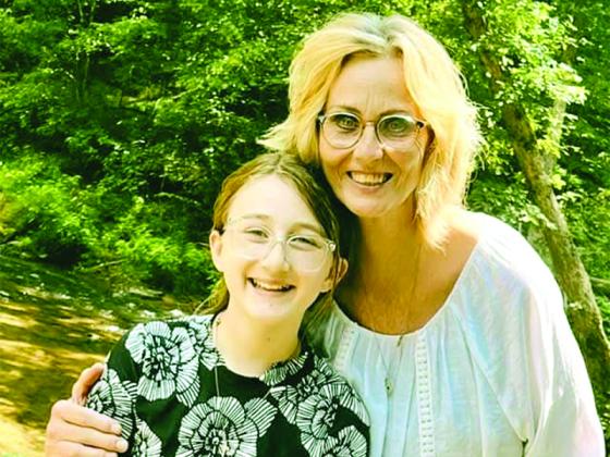 Mia McClure, left, and her grandmother Pamela Smith, right, spend some time together on a sunny day. (Contributed photo)