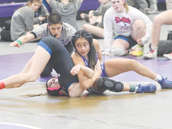 Gilmer’s Salma Gonzalez (above) and Gracie Cox (below) both secured pins for the Lady Cats last Friday versus Jefferson.