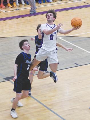 Senior Keegen Bryant glides through the air versus Northwest Whitfield and led the Bobcats with 23 points.
