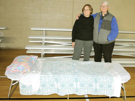 Nita Wasik, right, and co-chair Jackie Watson prepare the Gilmer County Warming Center for cold temperatures Friday, Feb. 6.