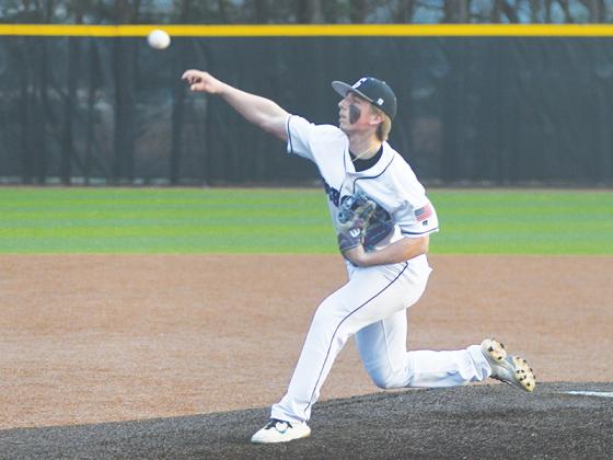 Senior Landen McClure delivers a pitch last Tuesday and was on the mound for 4 1/3 innings versus Lumpkin County.