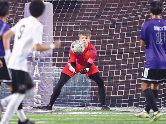 Bobcat goalkeeper Landon Hamby saves a shot versus Ridgeland last Thursday.