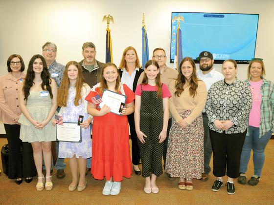 Award winners celebrate with those close to them at the Thursday, March 12, Daughters of the American Revolution’s awards ceremony. Shown from left are, front, Lillian Seay, Ella Bramlett, Nora Todd, Rosalie Greenberg, Brittany Todd and Hailey Greenberg; and, back, Kelly Seay, Glenn Seay, Dr. Gregory Withrow, Lori Bramlett, Michael Todd, Schott Leiter and Paula Hyatt.