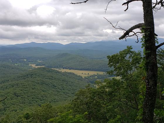 An overlook on the Benton MacKaye Trail reveals a stunning mountain view.