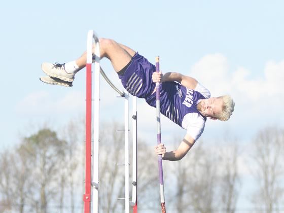 Senior Bobcat Cheyne Smith clears 11’ to win the pole vault last Thursday.