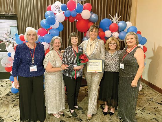 The Garden Club of Ellijay (GCE) celebrates winning the Garden Club of Georgia (GCG) trophy. Shown from left are former GCE President Edna McClellan, former GCE President Michelle Culberson, Co-President Joanne Waddey, Vice President Madeline Chandler Madeline Chandler, GCG State President Diane Hunter and former GCE President Kathy Shiner. (Contributed photo)