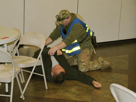 Cherokee County Fire Department Lieutenant Brandon Barton administers first aid to a “victim” during an active shooter drill Thursday, March 26.