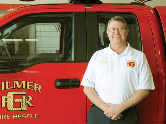 Emergency Medical Services (EMS) Division Fire Chief Paul Beamon stands beside the Gilmer Fire and Rescue vehicle that will transport blood for emergency response.