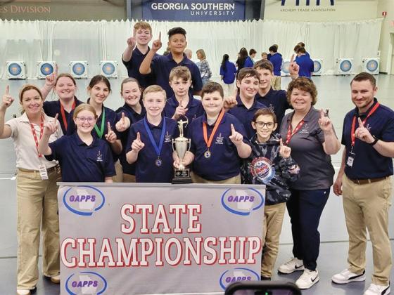 Pictured are NGCA archers and coaches following the Knights’ state championship. (Contributed)