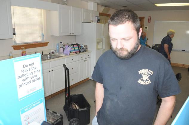Austin Peppers votes in the Tuesday, May 19 primary election in Gilmer County.
