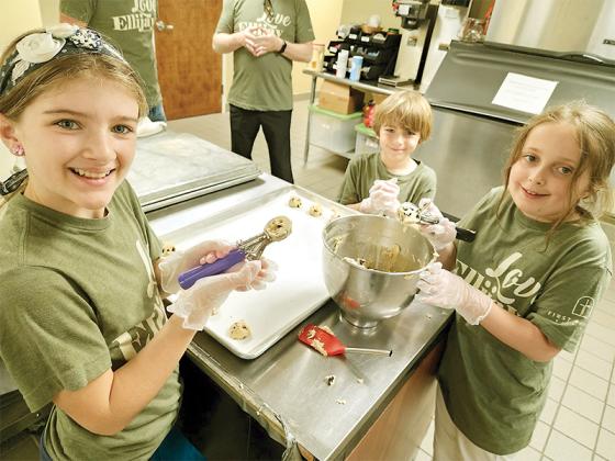 Kids from First Baptist Church of Ellijay make cookies and thank you cards for Gilmer first responders. Shown from left are Addy Hayes, Luke Hayes and Chandler Garrett.