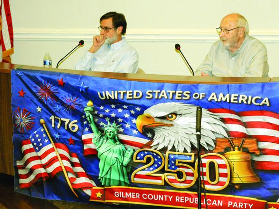 Doug Rink, left, and Chairman Charlie Paris, right, debate each other in their primary race for Board of County Commissioners Chairman.