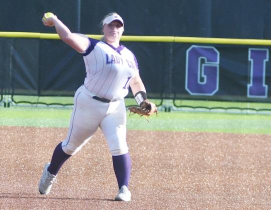 Phoenix Addie makes a throw to first base during her senior season at GHS.
