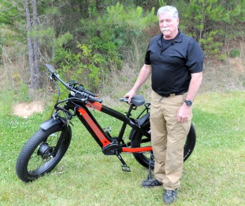 Special Operations Division Chief Jeff Statham reveals Gilmer County Fire and Rescue’s new electric bikes.