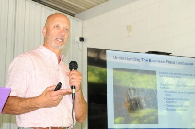 United Community Bank Chief Security Officer Jay Rajaee speaks on scams at a Gilmer Chamber of Commerce Luncheon Thursday, June 11.